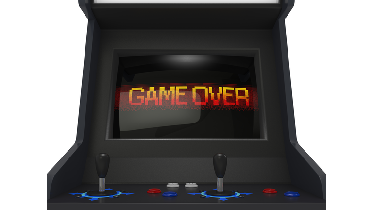 Game over screen on a black arcade game with two controllers