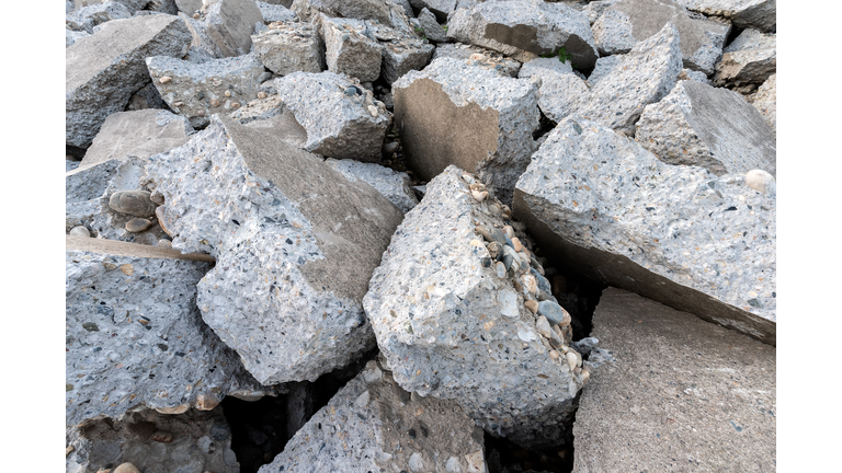 Destroyed concrete blocks. Full frame, close-up