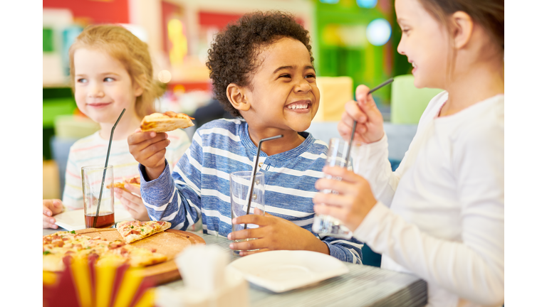 Happy  Children in Pizzeria