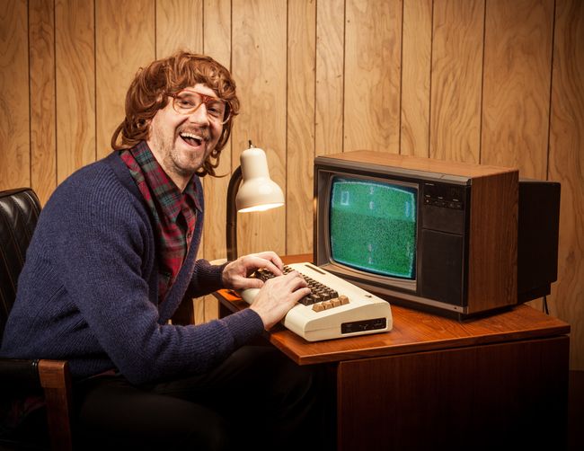 Shaggy haired Geeky Nerd Computer work man vintage style