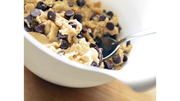 Chocolate Chip Cookie Dough in mixing bowl with spoon