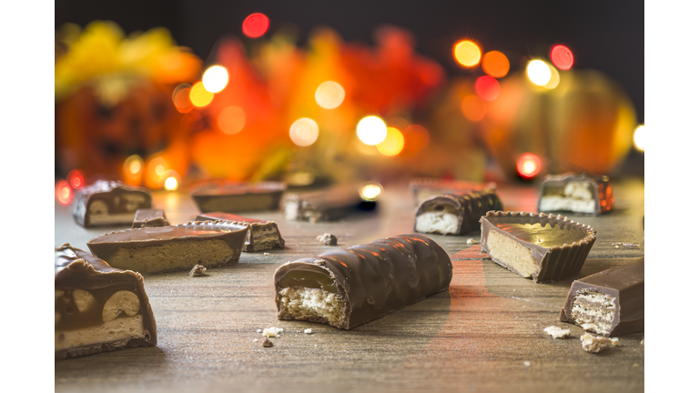Cut pieces of candy bars with a Halloween background