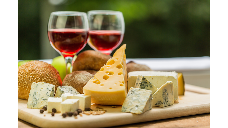 We asked the licensing Gods for a picture of cheese. They gave us this. Is there cheese in this picture? We don't see cheese. We see wine.