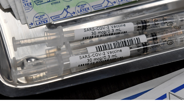 Las Vegas Health Care Workers Receive COVID-19 Vaccinations