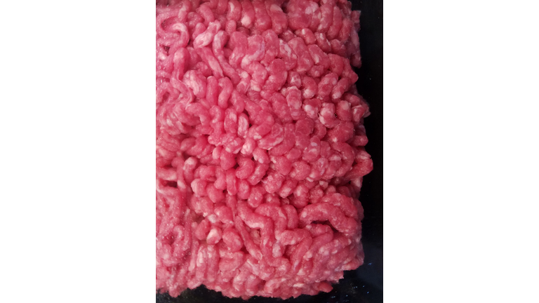 Fresh ground beef, red meat raw, from above, large amount