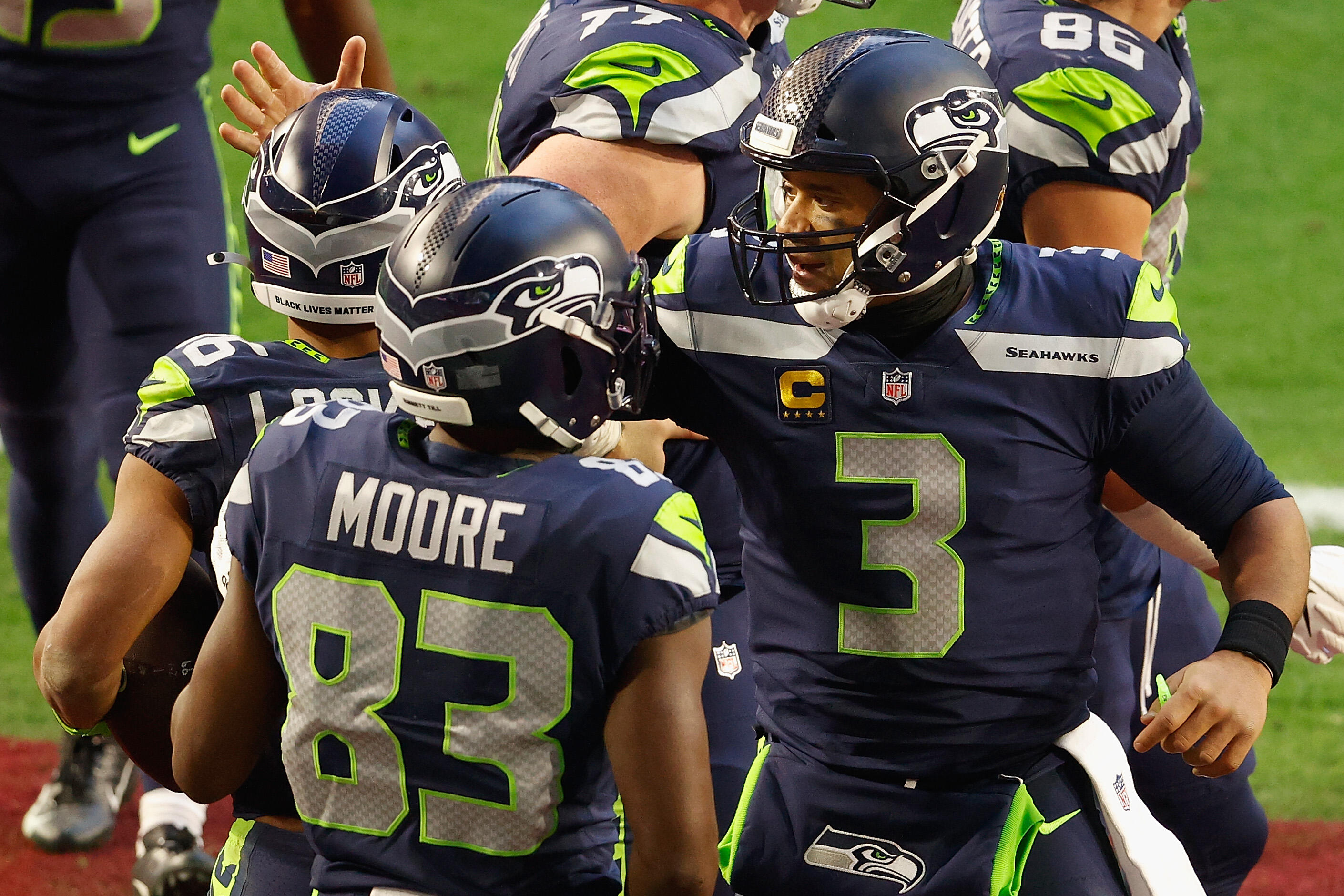 Russell Wilson's Last-Minute Audible Earned David Moore A $100,000 Bonus