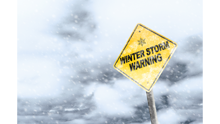 Winter Storm Warning Sign With Snowfall and Stormy Background