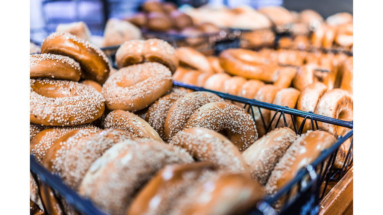 Closeup of many bagels in bakery