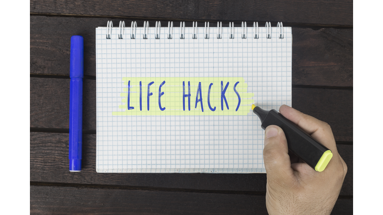 hand writing on notepad: Life hacks