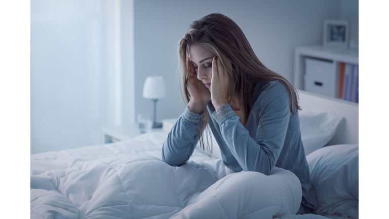 Depressed woman awake in the night