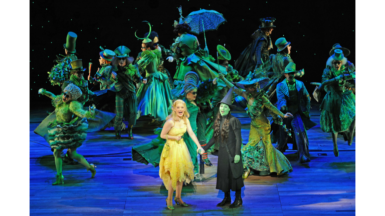 Glinda (C-L), played by Lucy Durack, and