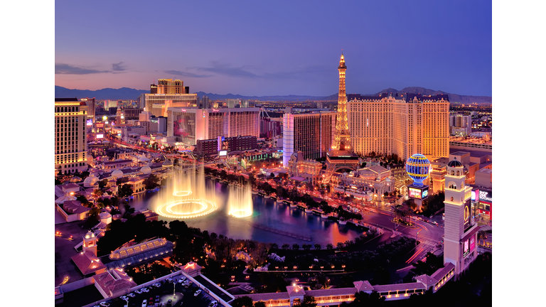 City skyline at night with Bellagio Hotel water fountains, Las Vegas, Nevada, America, USA