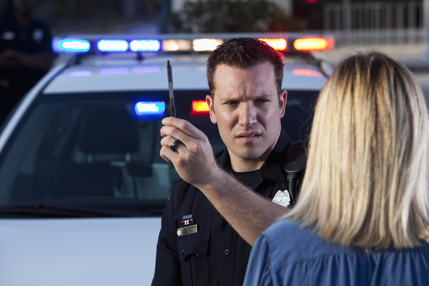 Police officer conducting sobriety test