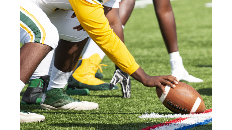 Football center ready to snap the ball