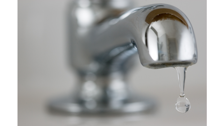Water Drips From Domestic Tap, UK