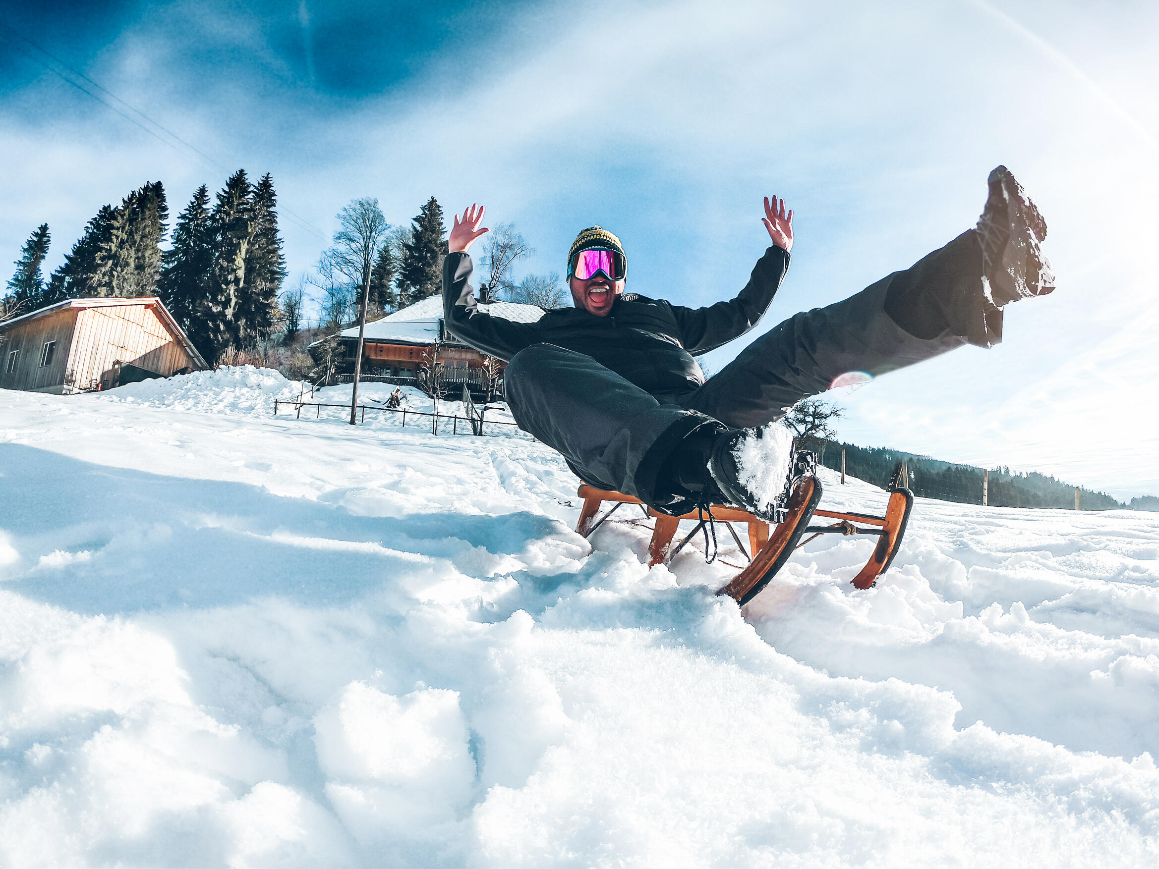 Ман сани. Sledding man.