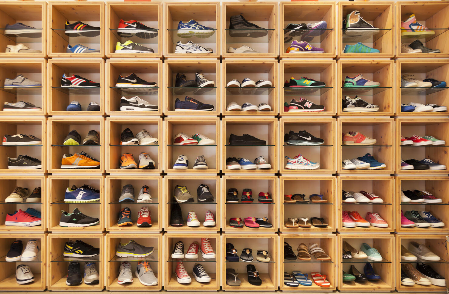 Different shoes displayed in a shoe shop.