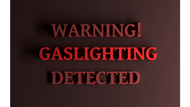 Red words Warning Gaslighting detected