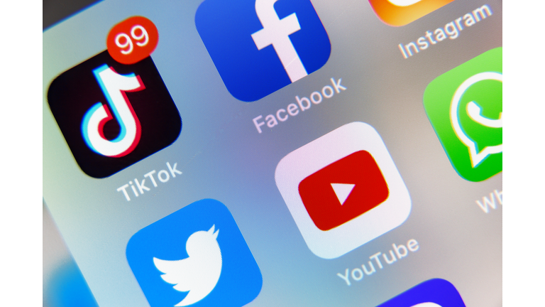 TikTok and Facebook, YouTube application  on screen Apple iPhone XR