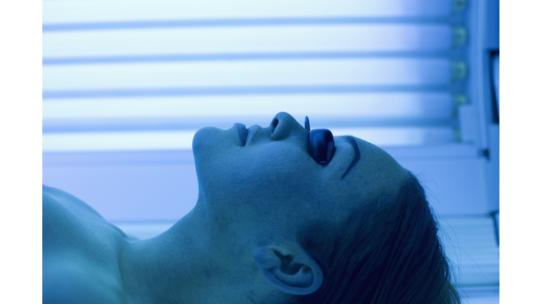 Woman in a Tanning Bed