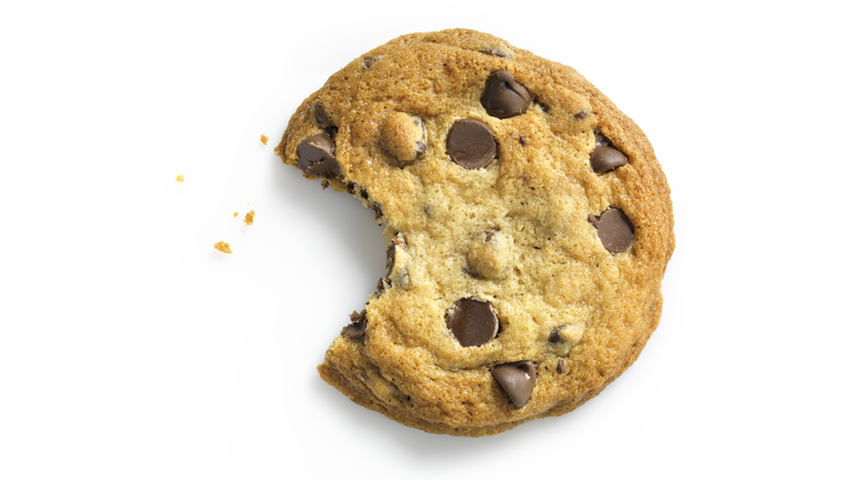 Chocolate Chip Cookie with bite on white