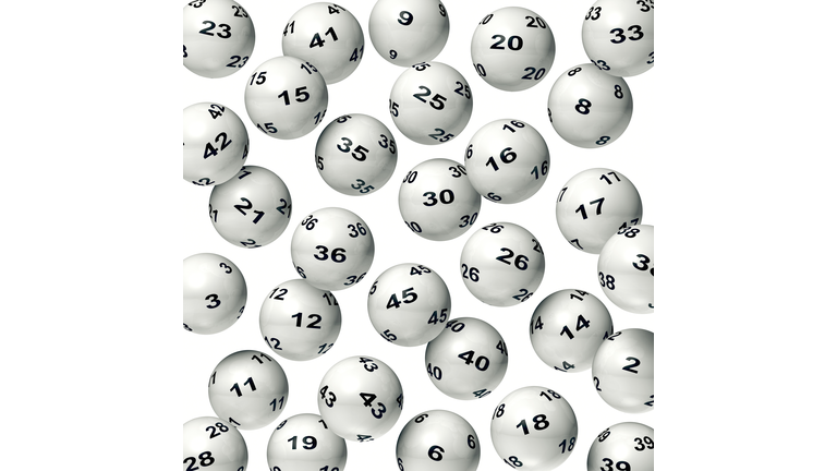 Falling Lottery Balls on White Background