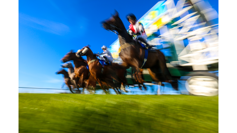Blurred motion of horse racing
