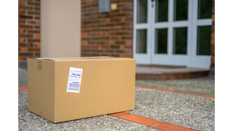 Cardboard package at the doorstep during coronavirus pandemic
