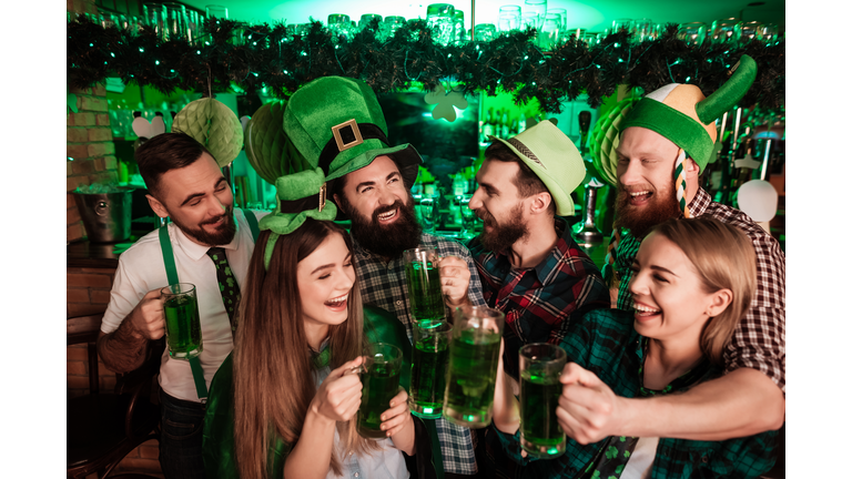 The company of young people celebrate St. Patrick's Day.