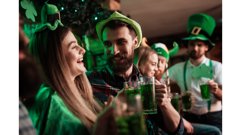 The company of young people celebrate St. Patrick's Day.