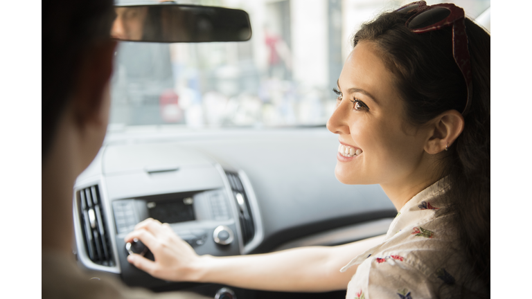 New York, Brooklyn, Woman playing car radio