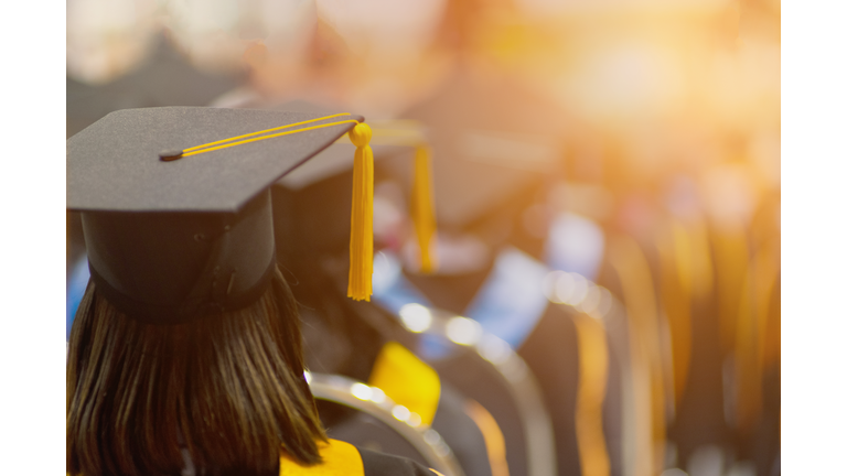 Rear View Of Woman Wearing Mortarboard During Graduation