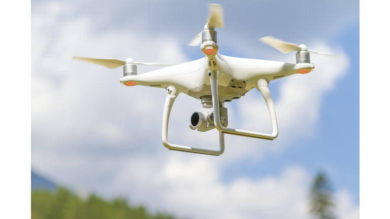Drone Flying Above Mountains