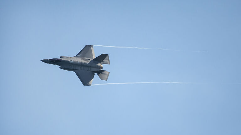 top view of stealth jet fighter flying, Lockheed Martin F-35