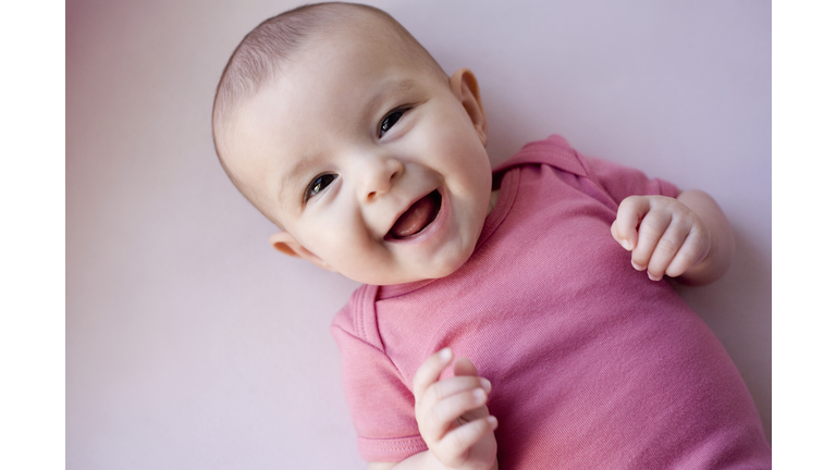 Baby girl laughing