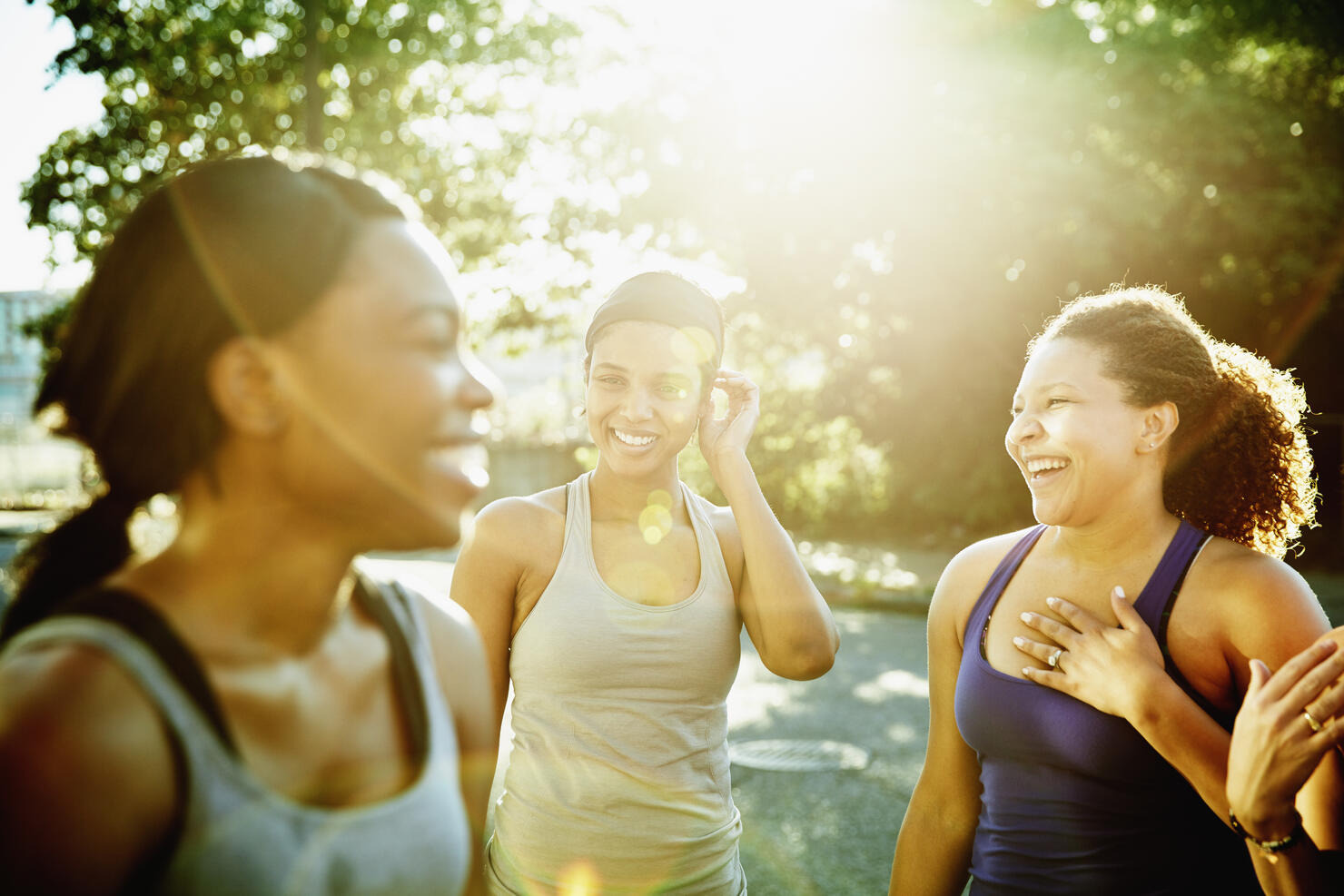 Friends laughing together after morning run