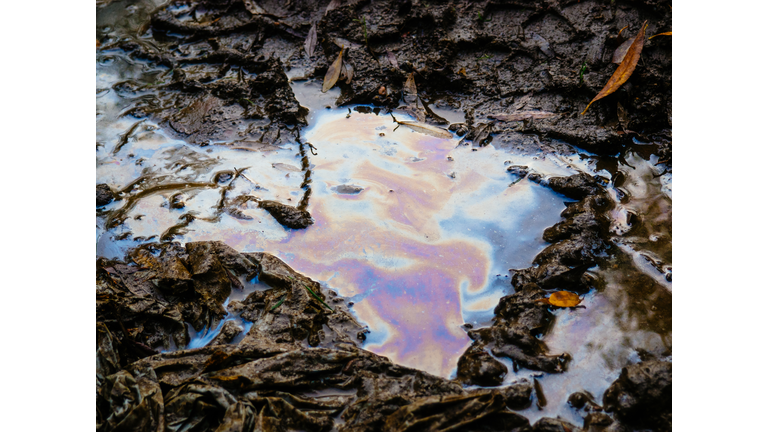 Spilled gasoline or other fuel into the water