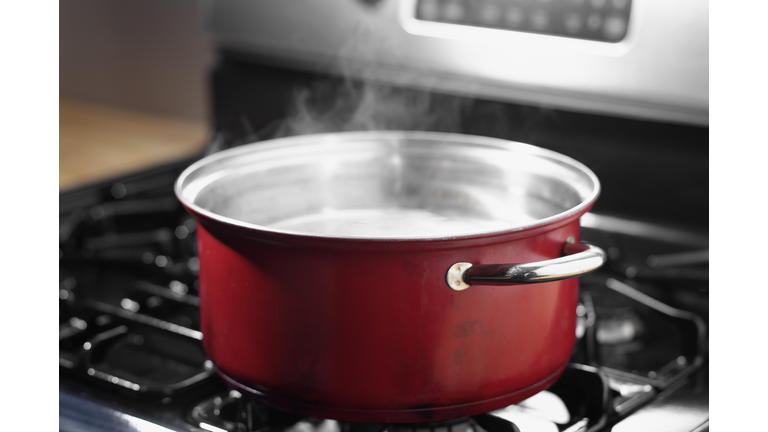 Pot of boiling water on stove top