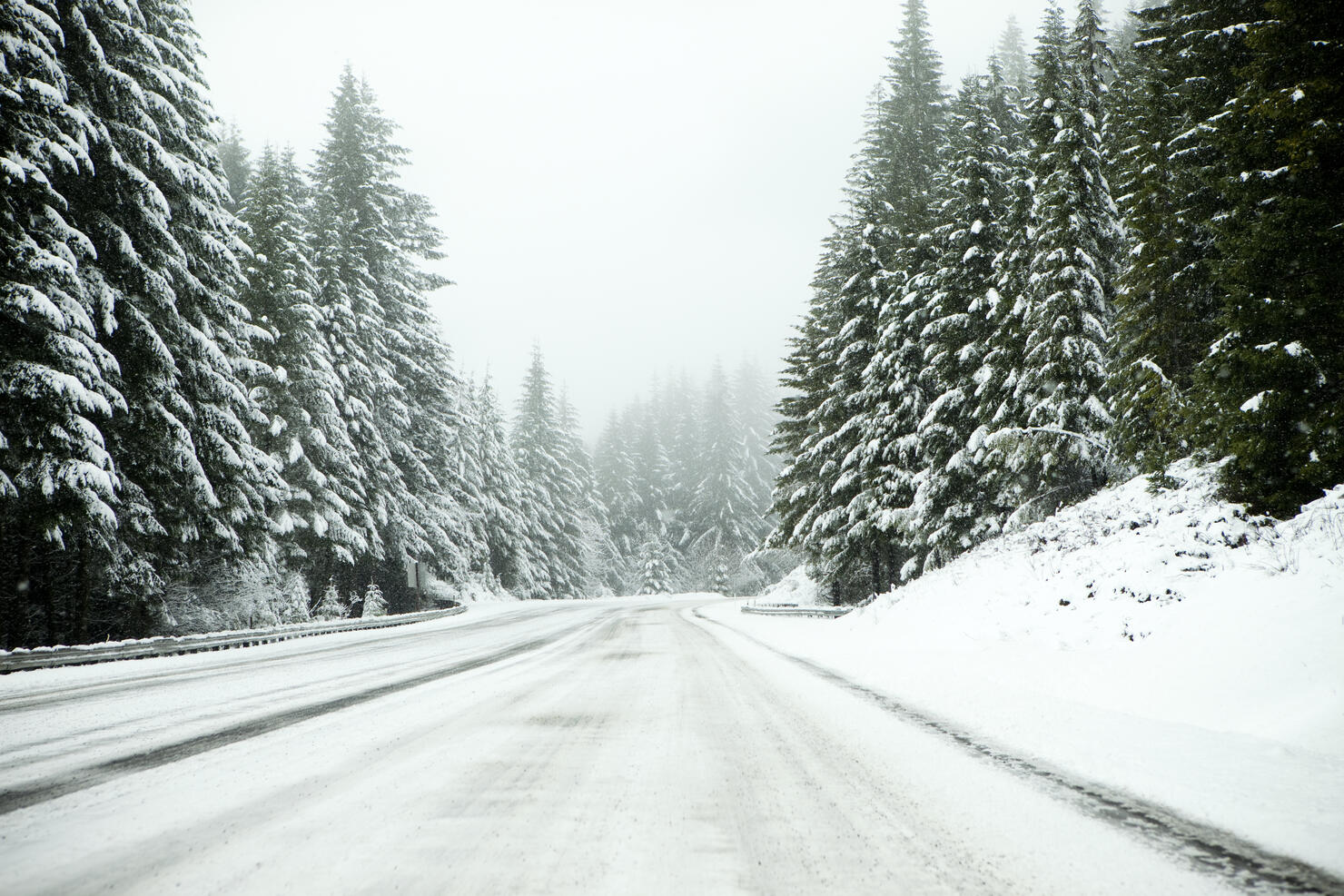 Driving a snowy and icy road.