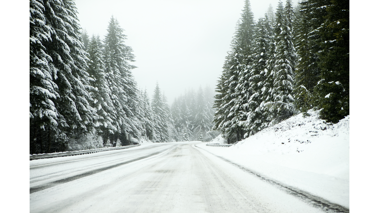 Driving a snowy and icy road.