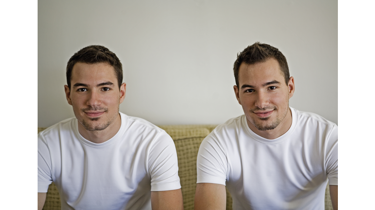 Twin brothers, smiling, portrait