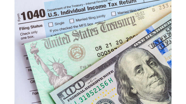 Money with Tax Check and Form 1040