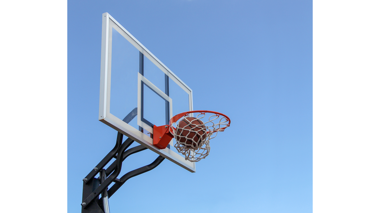 Basketball inside hoop