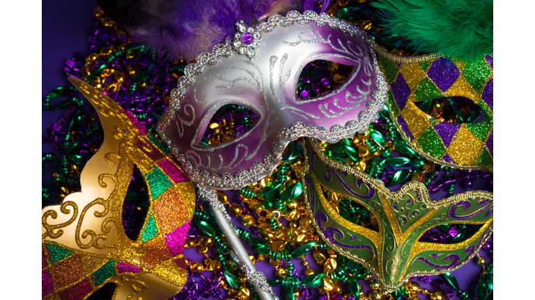 Assorted Mardi Gras or Carnivale mask on a purple background