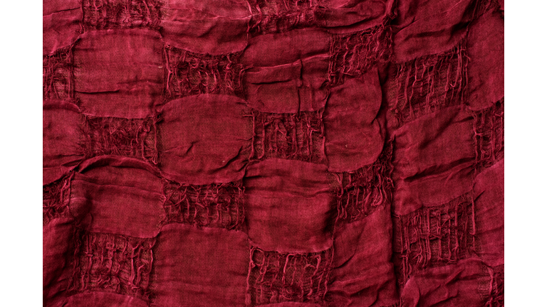 A full page of fuzzy burgundy red fleece fabric texture