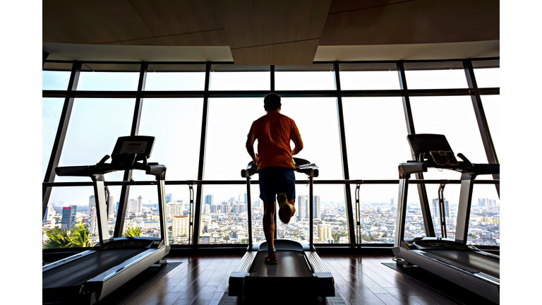 Healthy lifestyle: jogging in the gym.