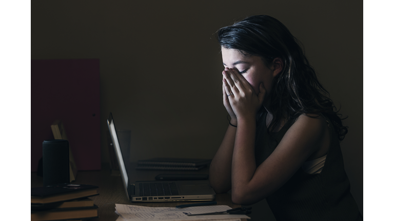 Upset Teenage Girl by Computer