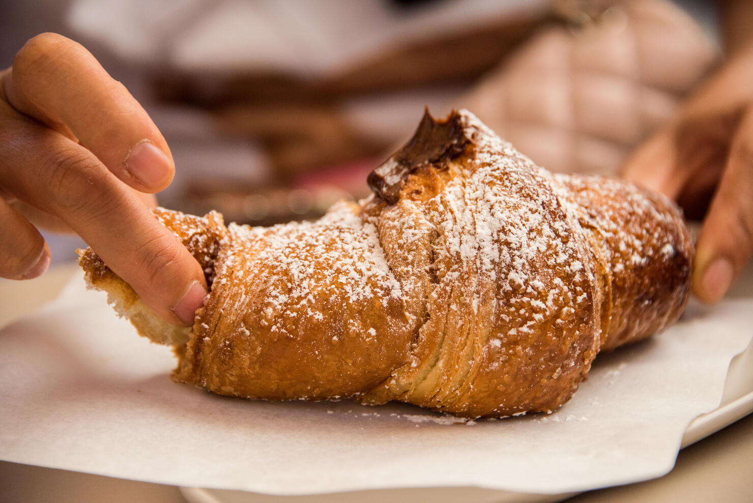 Eating a Sicilian chocolate croissant