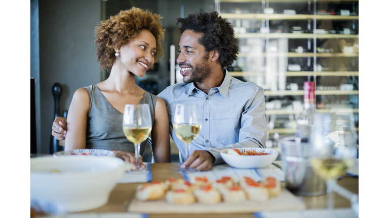 Romantic couple at a dinner party