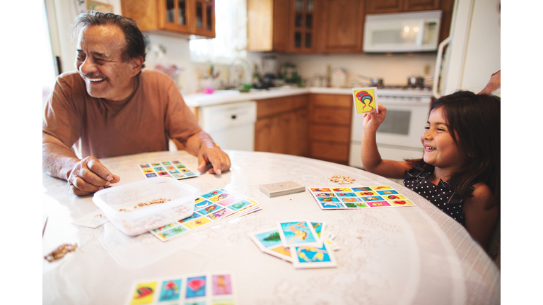 Grandpa and Granddaughter Play A Board Game